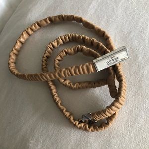 GUCCI elasticized tan brown leather belt w/silver buckle, size L/XL (32”-37”)